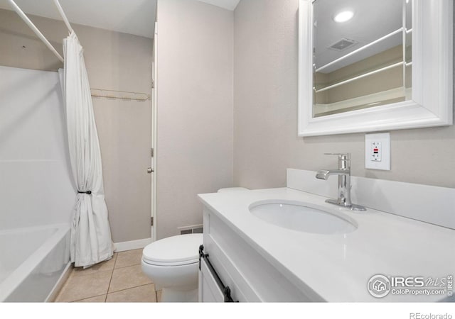 full bathroom with vanity, toilet, tile patterned floors, and shower / bathtub combination with curtain