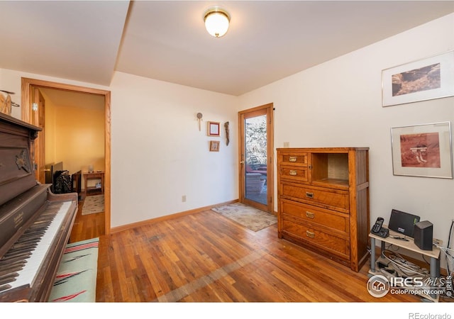 miscellaneous room featuring hardwood / wood-style flooring