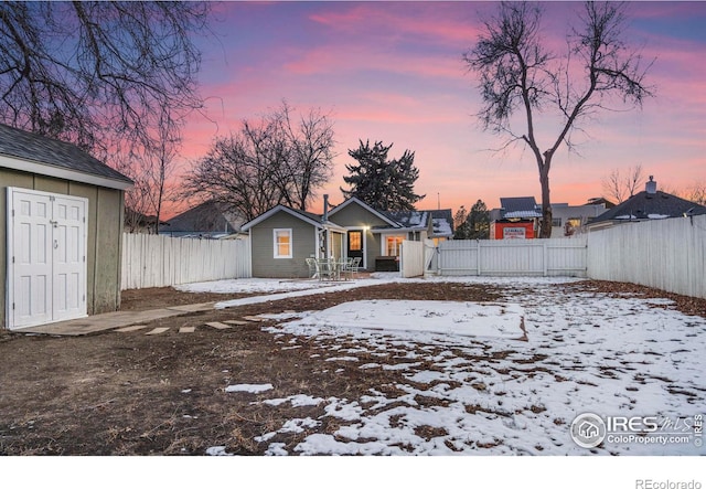 view of yard covered in snow