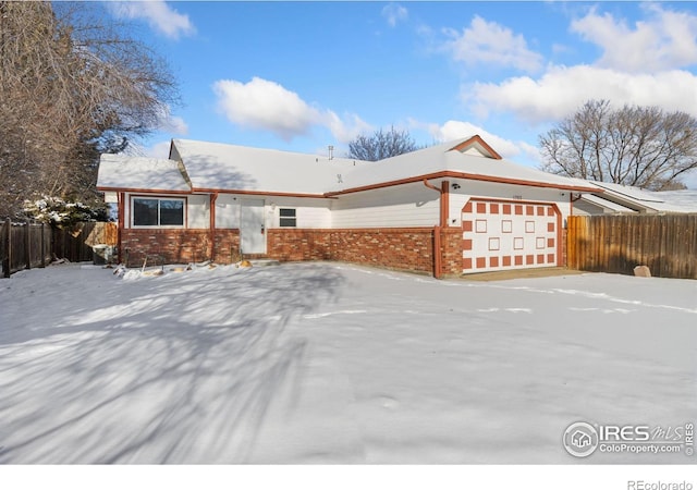 view of front of home featuring a garage