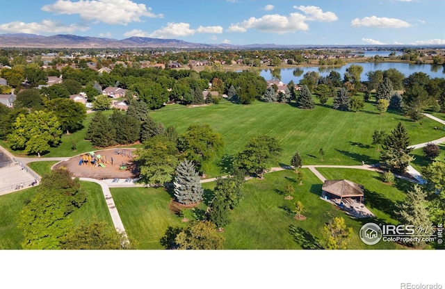 bird's eye view with a water and mountain view