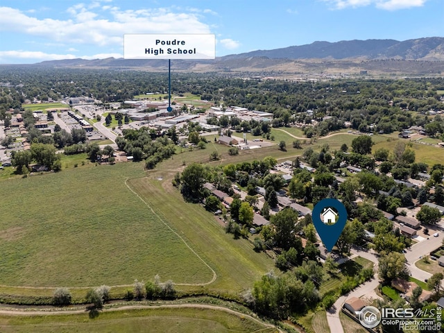 bird's eye view with a mountain view