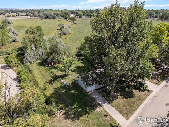 birds eye view of property featuring a rural view