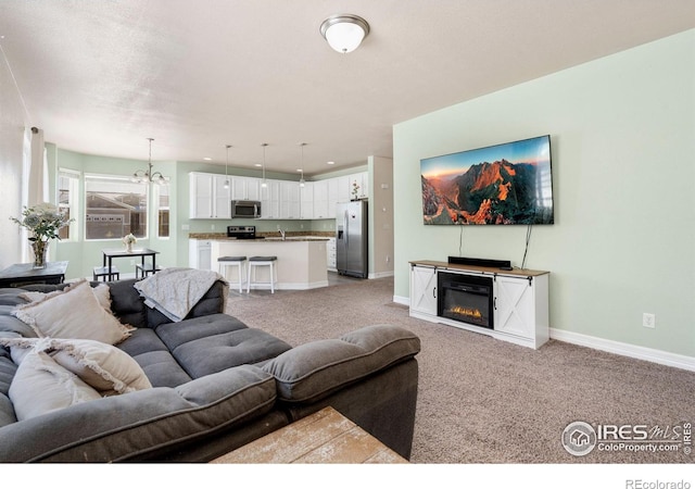 living room featuring light carpet