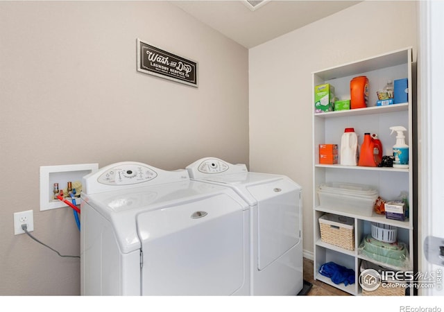 washroom featuring separate washer and dryer