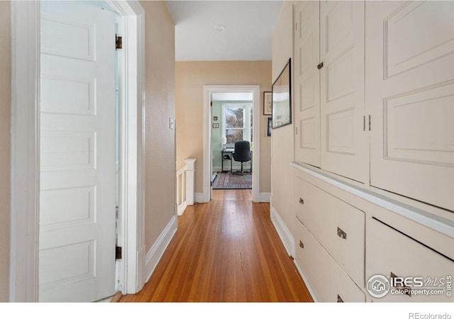 hallway featuring light hardwood / wood-style flooring