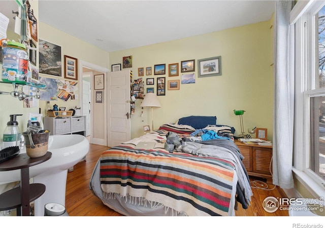 bedroom featuring hardwood / wood-style flooring