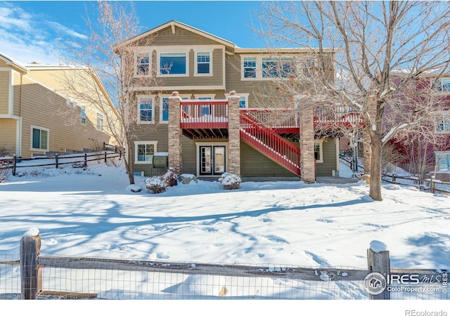 view of front of property featuring a wooden deck