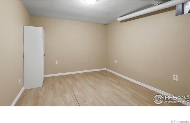 empty room with light wood-type flooring