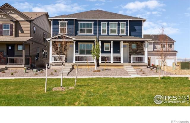 view of front of house featuring a front yard and a porch