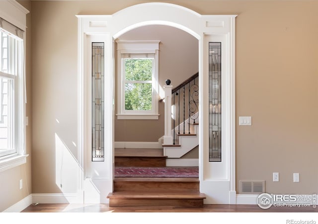 entrance foyer featuring hardwood / wood-style flooring