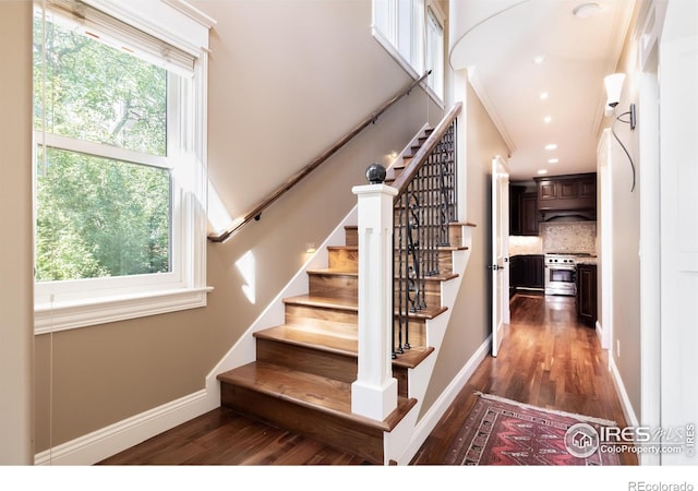 stairway with wood-type flooring