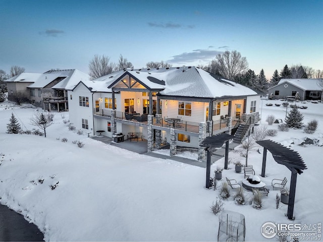 view of snow covered house