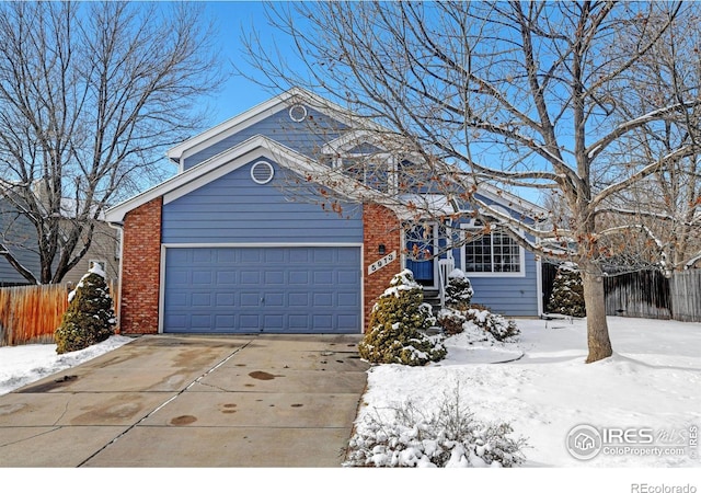 view of front of property with a garage