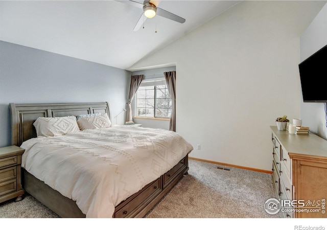 bedroom with light carpet, visible vents, baseboards, a ceiling fan, and lofted ceiling