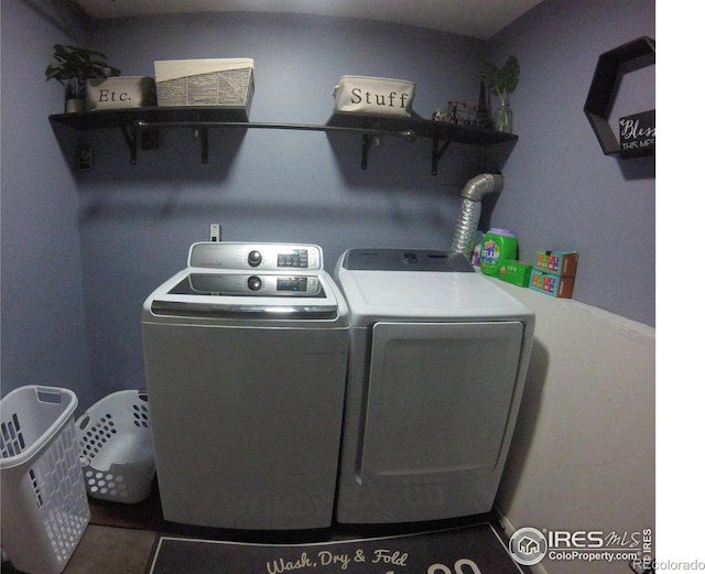 laundry room featuring laundry area and separate washer and dryer