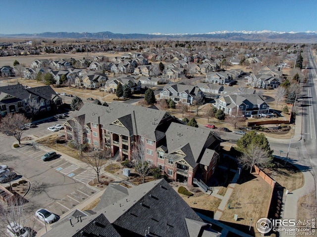 aerial view with a residential view and a mountain view