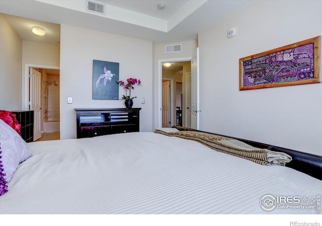 bedroom with visible vents