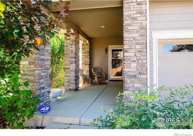 view of patio with a garage