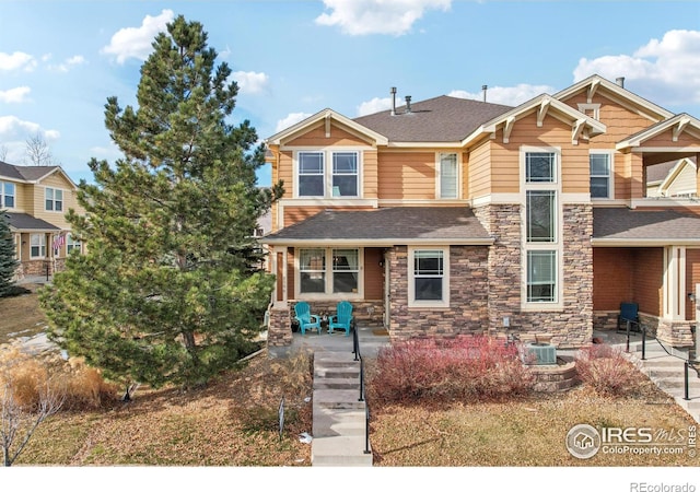 craftsman-style house with a patio area