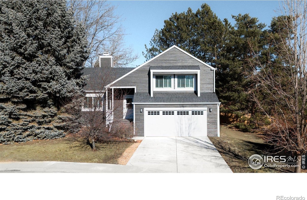 view of front of property featuring a garage