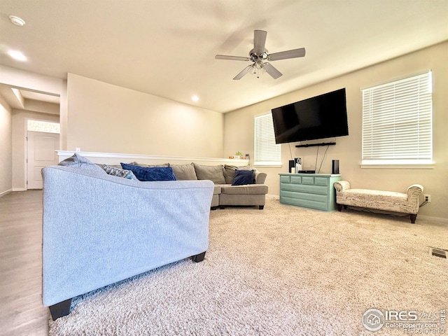 living room with ceiling fan