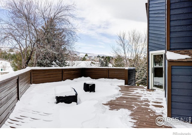 view of yard layered in snow