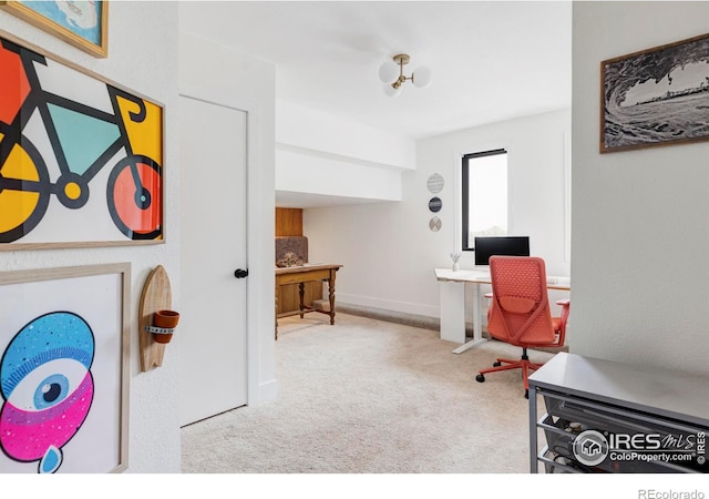 office area featuring light colored carpet