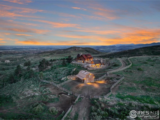 aerial view at dusk with a mountain view