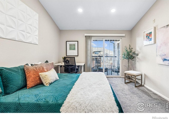 carpeted bedroom featuring lofted ceiling and access to outside