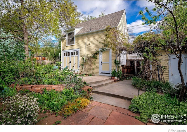 back of house with a patio area