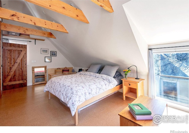 bedroom featuring vaulted ceiling with beams