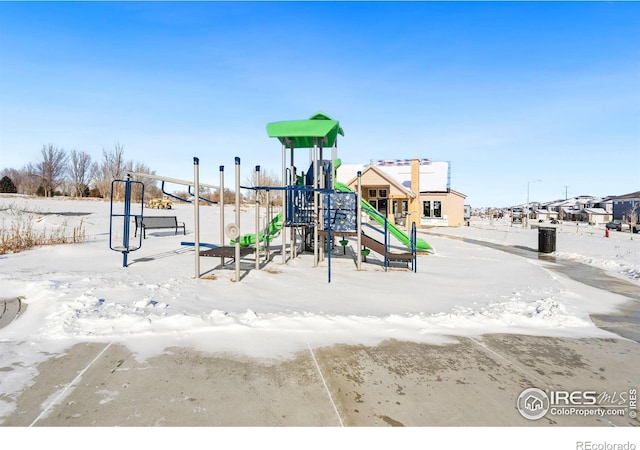 view of snow covered playground