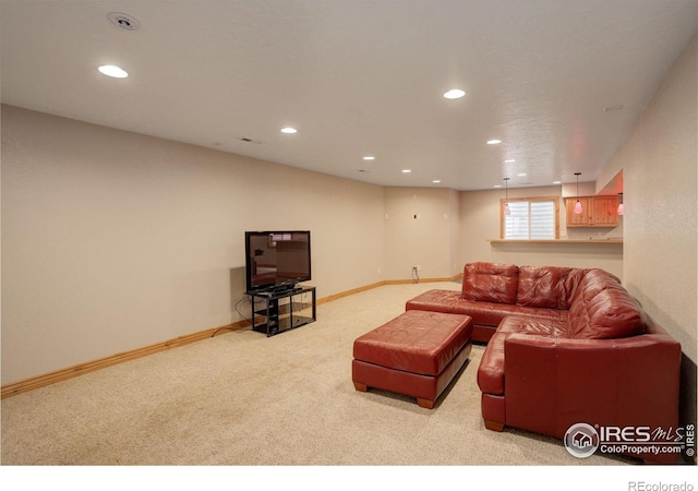 living room featuring light colored carpet