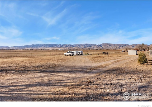 property view of mountains with a rural view