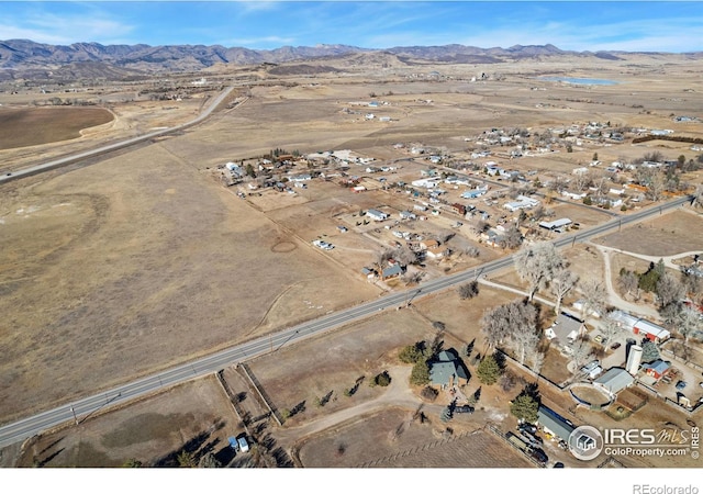 bird's eye view with a mountain view