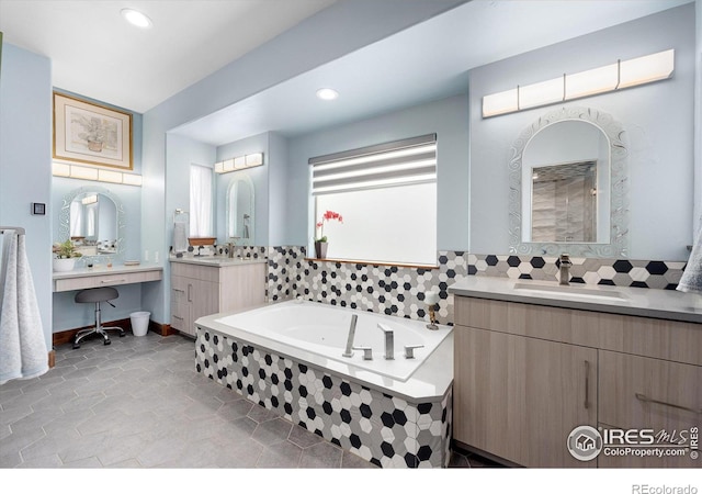 bathroom with tile patterned floors and vanity