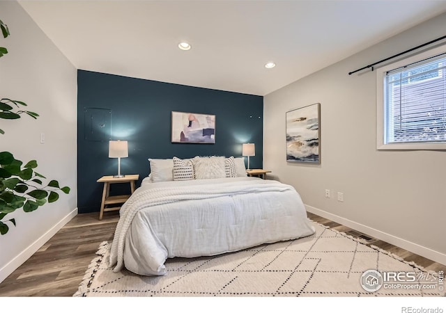 bedroom featuring wood-type flooring