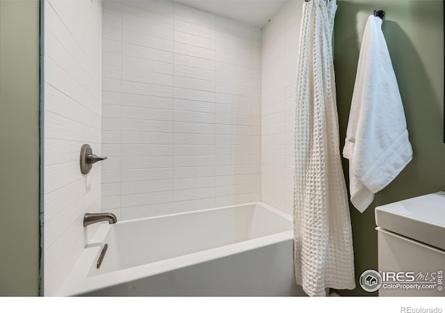 bathroom featuring shower / bath combination with curtain