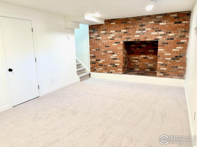 unfurnished living room with carpet