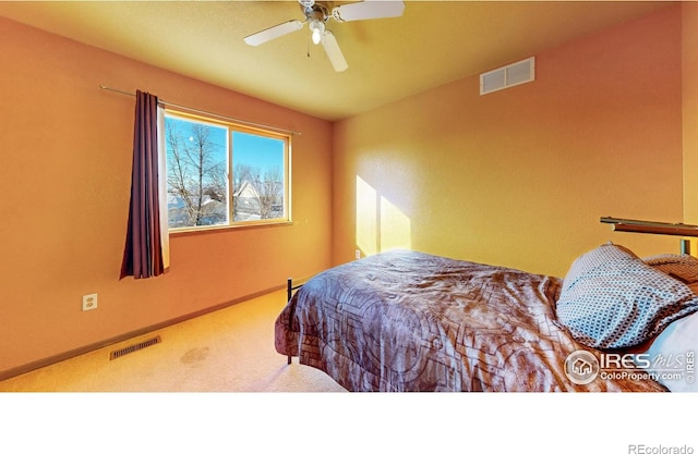 bedroom featuring ceiling fan and carpet flooring