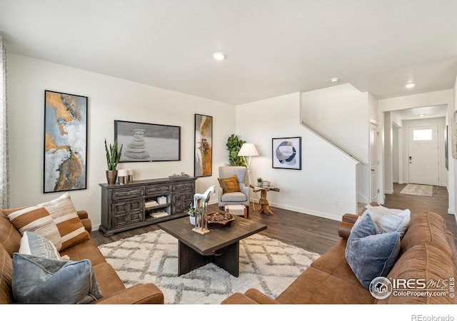 living room with wood-type flooring