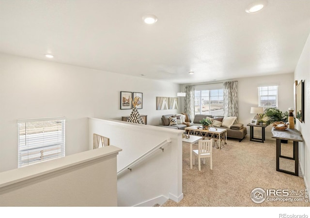 living room featuring light colored carpet