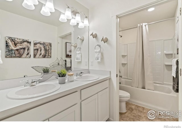 full bathroom with toilet, vanity, and shower / tub combo with curtain