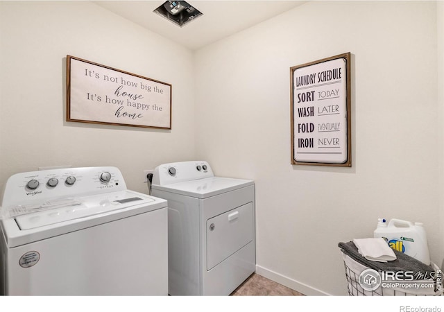 laundry area with independent washer and dryer