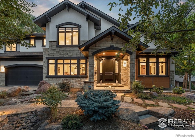 view of front of property featuring a garage