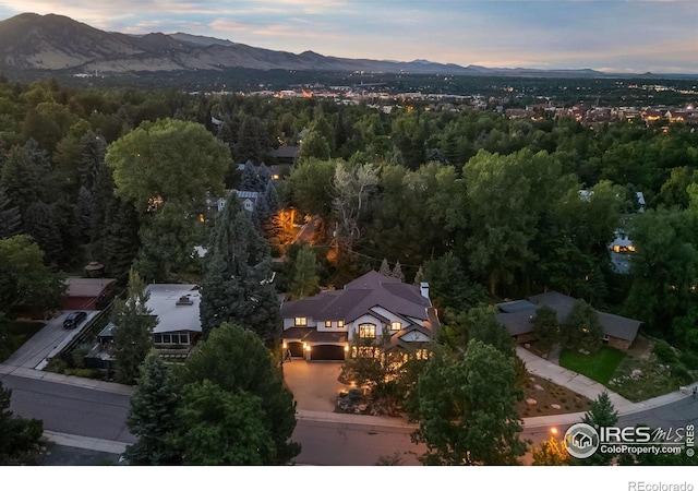 aerial view at dusk with a mountain view