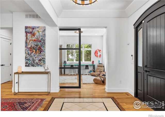 foyer featuring hardwood / wood-style flooring