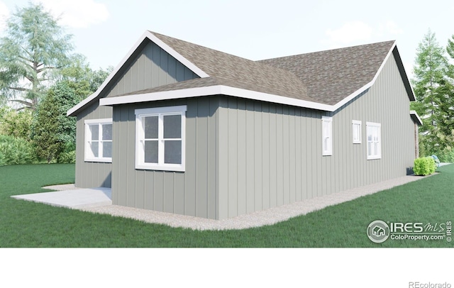 view of home's exterior with a yard