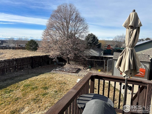 view of yard featuring a wooden deck